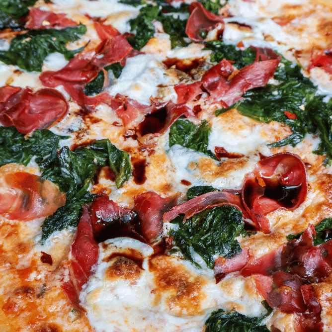 prosciutto mustard green flatbread with balsamic honey